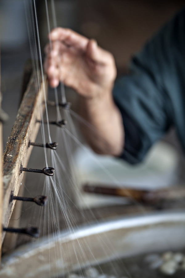Weaving silk thread